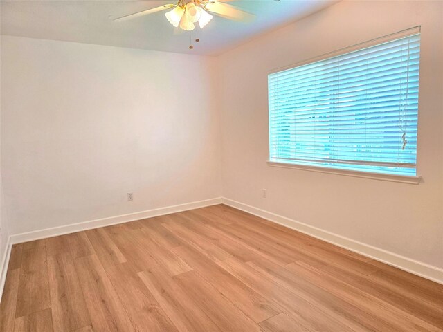 3307 Twelve Oaks Ln, Missouri City, TX 77459 - unfurnished room featuring light wood-type flooring and ceiling fan