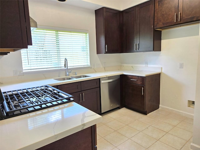 3307 Twelve Oaks Ln, Missouri City, TX 77459 - kitchen featuring stainless steel dishwasher, dark brown cabinetry, light tile patterned floors, and light stone counters