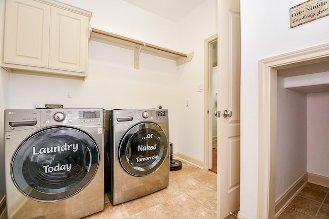 19707 Mission Pines Ln, Richmond, TX 77407 - laundry area featuring cabinet space, separate washer and dryer, light tile patterned floors, and baseboards