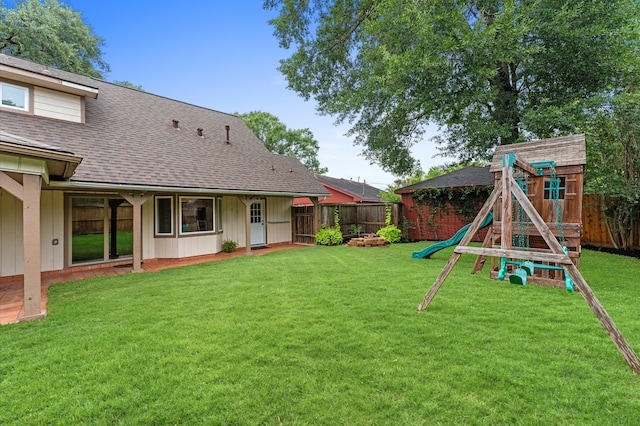 9407 Brooding Oak Cir, Houston, TX 77096 - fenced backyard featuring a playground