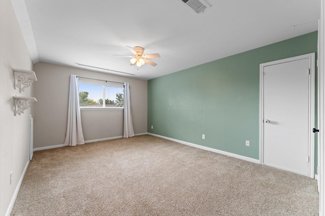 9407 Brooding Oak Cir, Houston, TX 77096 - carpeted empty room featuring a ceiling fan and baseboards