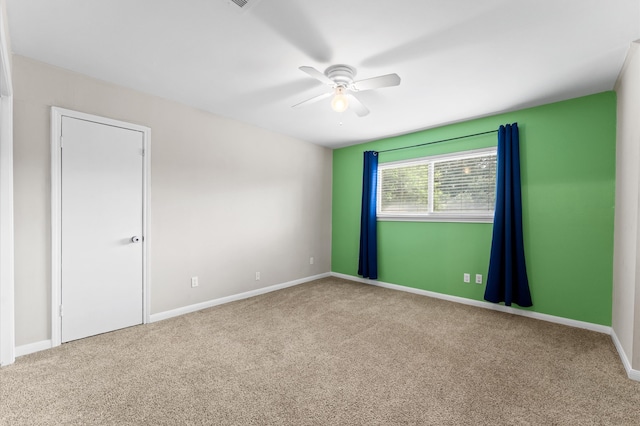 9407 Brooding Oak Cir, Houston, TX 77096 - carpeted empty room with ceiling fan and baseboards