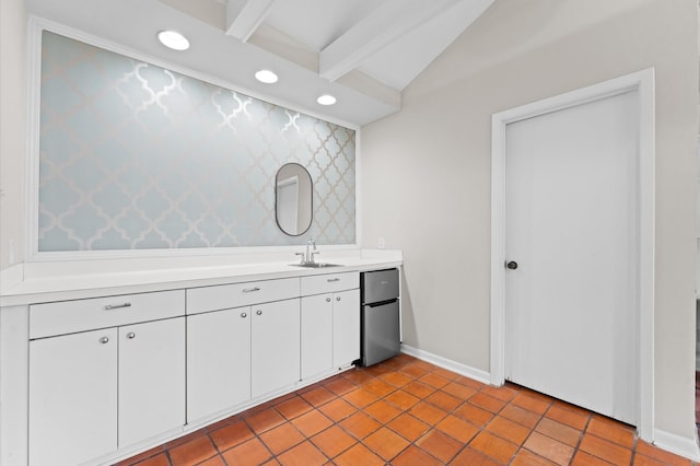 9407 Brooding Oak Cir, Houston, TX 77096 - kitchen featuring stainless steel refrigerator, light countertops, recessed lighting, white cabinets, and tile patterned floors