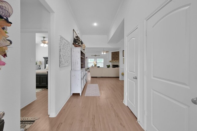 16220 Fayette St, Conroe, TX 77303 - hall with light wood-style floors, recessed lighting, crown molding, and baseboards