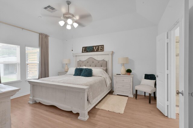16220 Fayette St, Conroe, TX 77303 - bedroom featuring light wood finished floors, baseboards, and a ceiling fan