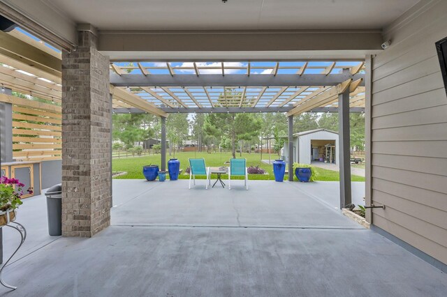 16220 Fayette St, Conroe, TX 77303 - view of patio featuring a pergola and an outdoor structure