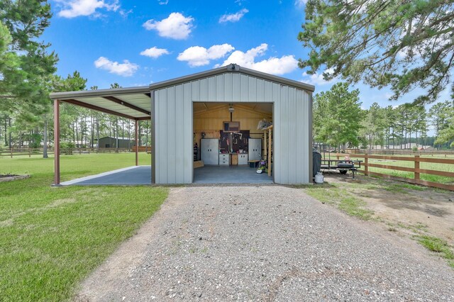 16220 Fayette St, Conroe, TX 77303 - view of pole building with driveway