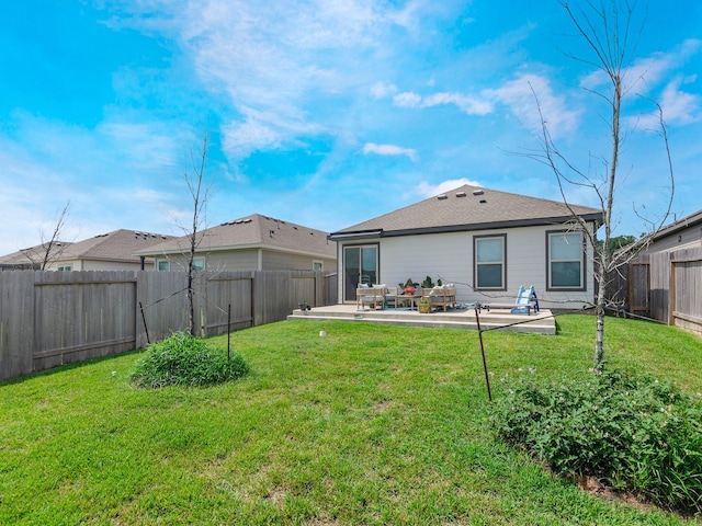 14942 Dane Ct, Conroe, TX 77316 - back of house featuring a patio area