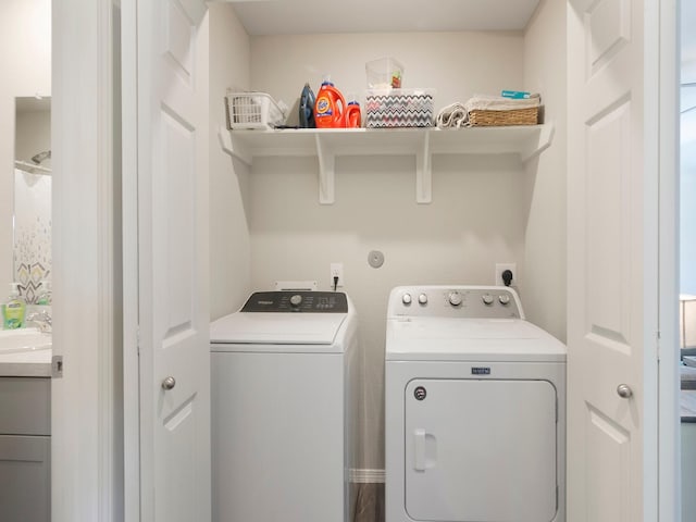 14942 Dane Ct, Conroe, TX 77316 - laundry room with washing machine and dryer