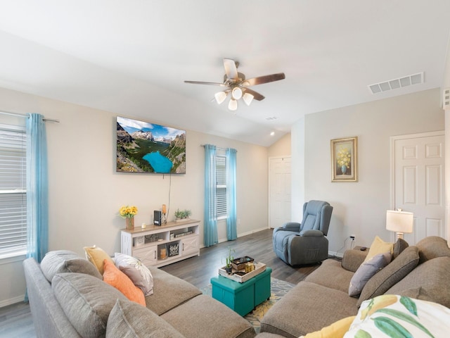 14942 Dane Ct, Conroe, TX 77316 - living room featuring ceiling fan, baseboards, wood finished floors, and vaulted ceiling