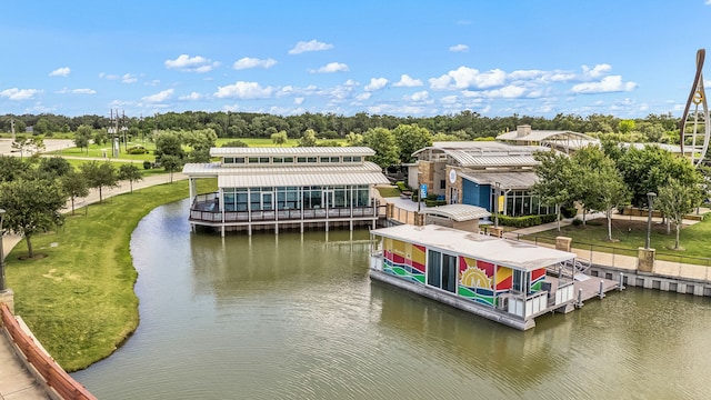 4138 Watson Dr, Rosharon, TX 77583 - dock with a water view, boat lift, and view of wooded area