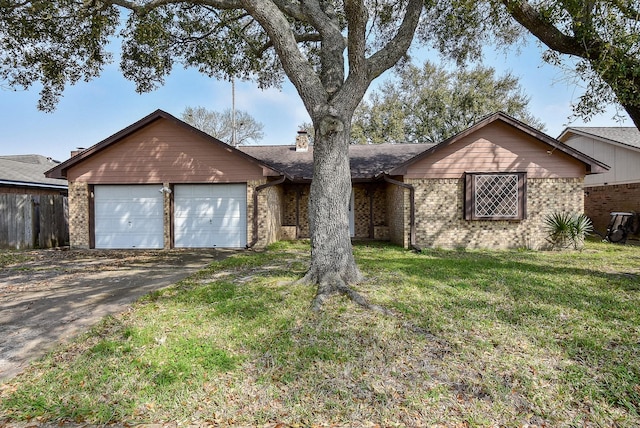 3310 Park Haven Ln, Deer Park, TX 77536 - ranch-style home with brick siding, a garage, a chimney, and driveway