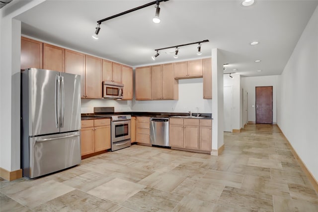 1601 W Webster St Unit 9, Houston, TX 77019 - kitchen with appliances with stainless steel finishes, light brown cabinets, dark countertops, and recessed lighting