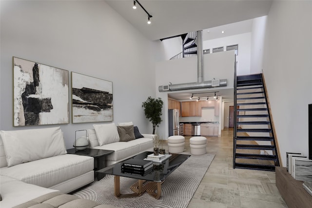 1601 W Webster St Unit 9, Houston, TX 77019 - living room with track lighting and a towering ceiling