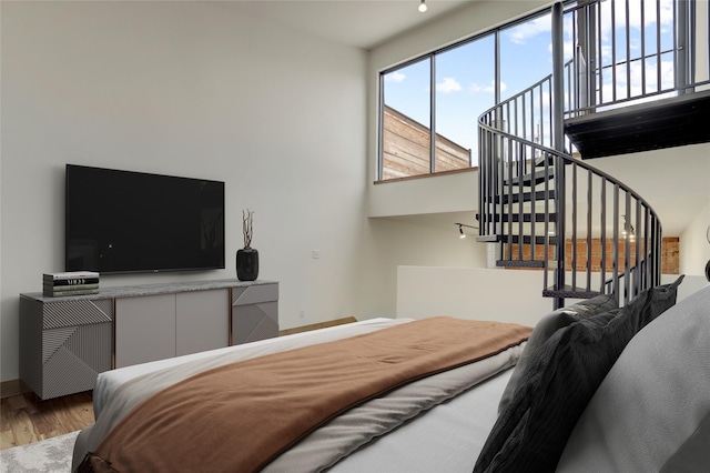 1601 W Webster St Unit 9, Houston, TX 77019 - bedroom featuring wood finished floors