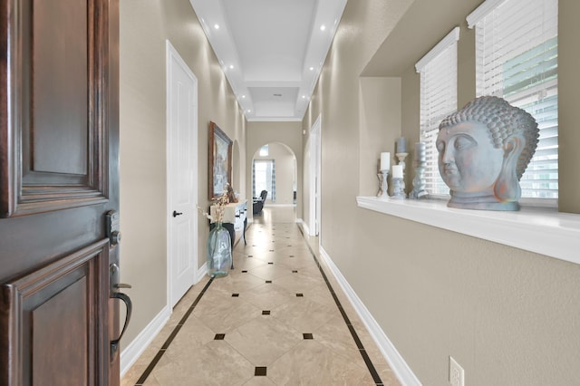 116 Owen Ridge Dr, Conroe, TX 77384 - hallway featuring arched walkways, light tile patterned floors, recessed lighting, and baseboards