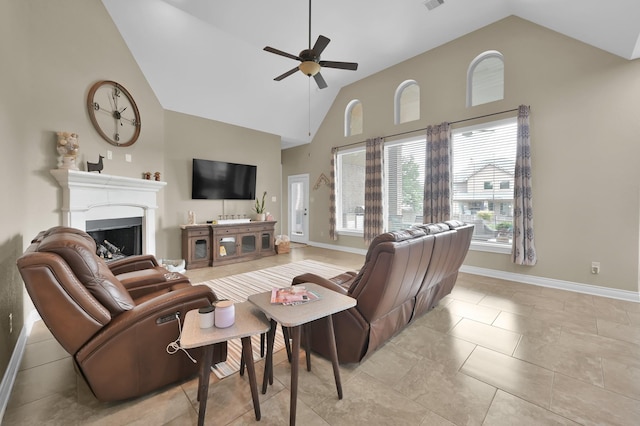 116 Owen Ridge Dr, Conroe, TX 77384 - living room with a ceiling fan, high vaulted ceiling, a fireplace, and baseboards