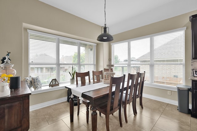 116 Owen Ridge Dr, Conroe, TX 77384 - dining room featuring healthy amount of natural light, baseboards, and light tile patterned flooring