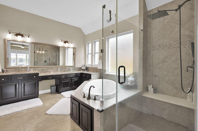 116 Owen Ridge Dr, Conroe, TX 77384 - full bath with a shower stall, vanity, a bath, lofted ceiling, and tile patterned floors