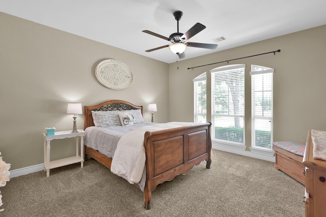 116 Owen Ridge Dr, Conroe, TX 77384 - bedroom featuring light colored carpet, baseboards, and ceiling fan