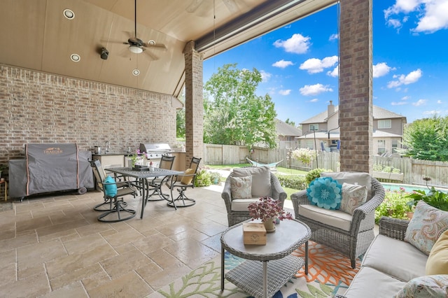 116 Owen Ridge Dr, Conroe, TX 77384 - fenced backyard featuring outdoor lounge area, a patio, ceiling fan, and outdoor dining space