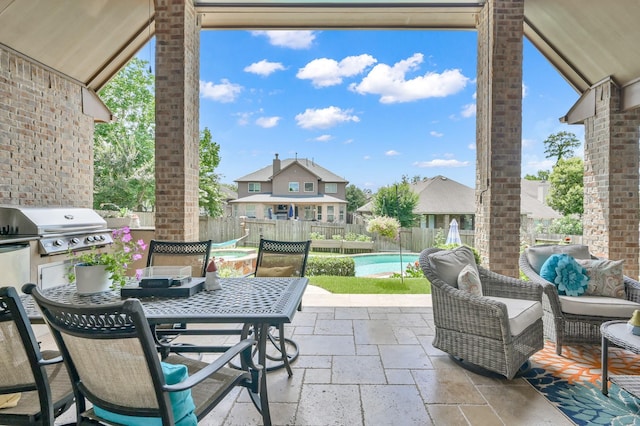 116 Owen Ridge Dr, Conroe, TX 77384 - fenced backyard with area for grilling, a patio, and outdoor dining space