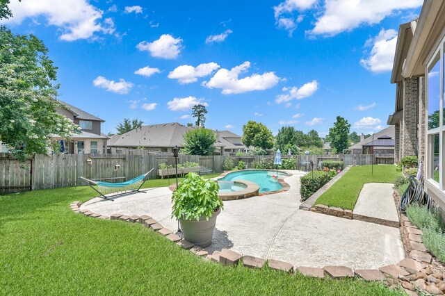 116 Owen Ridge Dr, Conroe, TX 77384 - view of pool with a patio area, a pool with connected hot tub, and a residential view
