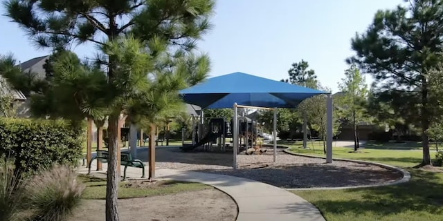 116 Owen Ridge Dr, Conroe, TX 77384 - view of community featuring a lawn