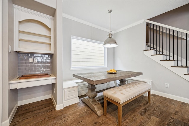 1310 Cohn St, Houston, TX 77007 - dining area featuring dark wood-style floors, baseboards, crown molding, and stairway