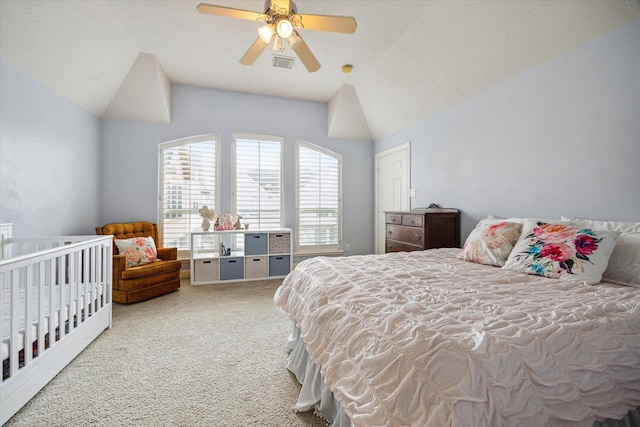 1310 Cohn St, Houston, TX 77007 - carpeted bedroom featuring lofted ceiling and a ceiling fan