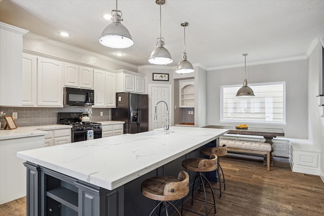 1310 Cohn St, Houston, TX 77007 - kitchen with black appliances, open shelves, white cabinets, ornamental molding, and backsplash