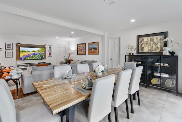 3923 W Main St, Houston, TX 77027 - dining area with light tile patterned flooring and recessed lighting