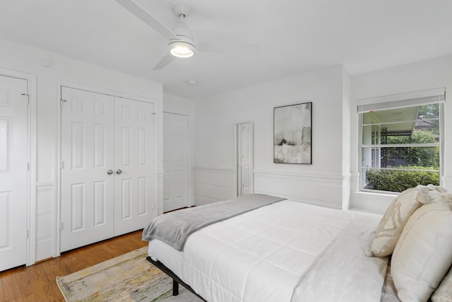3923 W Main St, Houston, TX 77027 - bedroom featuring wood finished floors, ceiling fan, and a closet