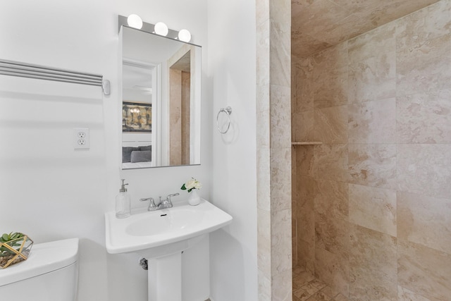 3923 W Main St, Houston, TX 77027 - bathroom featuring toilet and tiled shower