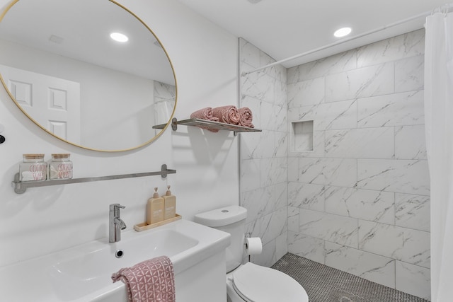 3923 W Main St, Houston, TX 77027 - full bathroom featuring toilet, a tile shower, recessed lighting, and vanity