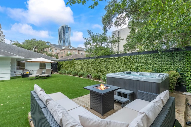3923 W Main St, Houston, TX 77027 - view of patio / terrace featuring a hot tub and an outdoor living space with a fire pit
