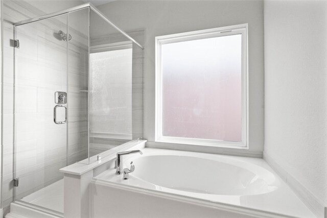 2547 Forest Cedar Ln, Conroe, TX 77301 - full bathroom with a garden tub and a shower stall