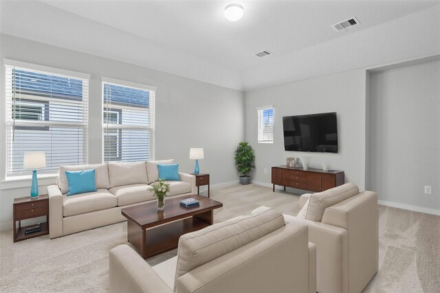 2547 Forest Cedar Ln, Conroe, TX 77301 - living room featuring light carpet and baseboards