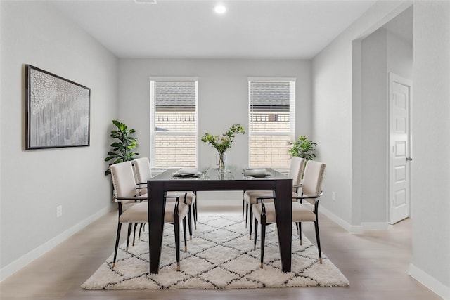 2547 Forest Cedar Ln, Conroe, TX 77301 - dining area featuring wood finished floors and recessed lighting