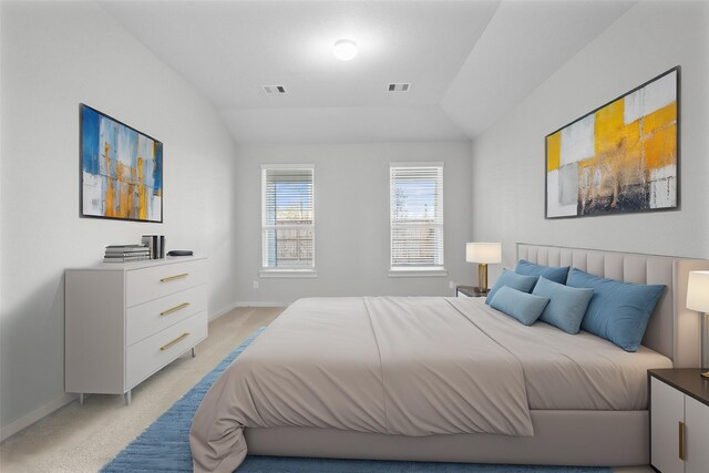 2547 Forest Cedar Ln, Conroe, TX 77301 - bedroom featuring lofted ceiling and light colored carpet