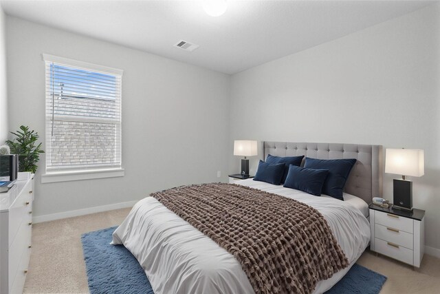 2547 Forest Cedar Ln, Conroe, TX 77301 - bedroom with light carpet and baseboards