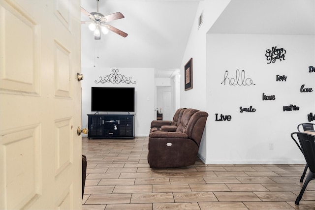13031 Crystal Cove Dr, Houston, TX 77044 - living room with wood finish floors, a ceiling fan, and vaulted ceiling