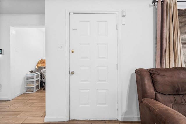 13031 Crystal Cove Dr, Houston, TX 77044 - entryway featuring light wood-type flooring and baseboards
