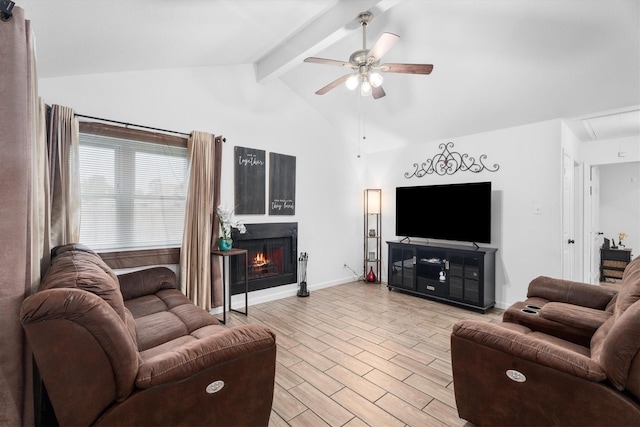 13031 Crystal Cove Dr, Houston, TX 77044 - living room featuring attic access, ceiling fan, a lit fireplace, and light wood-type flooring