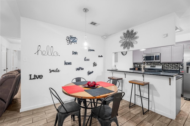 13031 Crystal Cove Dr, Houston, TX 77044 - dining space featuring light wood-style flooring