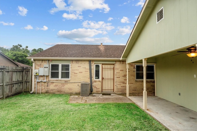 13031 Crystal Cove Dr, Houston, TX 77044 - back of property featuring roof with shingles, a patio area, and brick siding