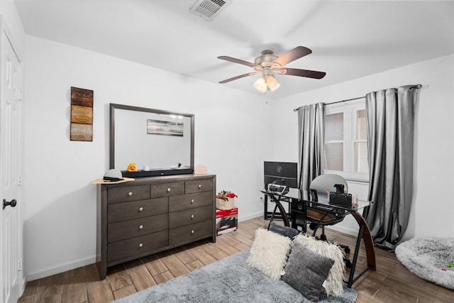 13031 Crystal Cove Dr, Houston, TX 77044 - office with light wood-style floors and a ceiling fan