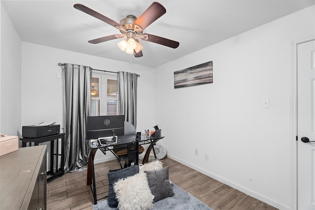 13031 Crystal Cove Dr, Houston, TX 77044 - office area featuring ceiling fan and wood finished floors