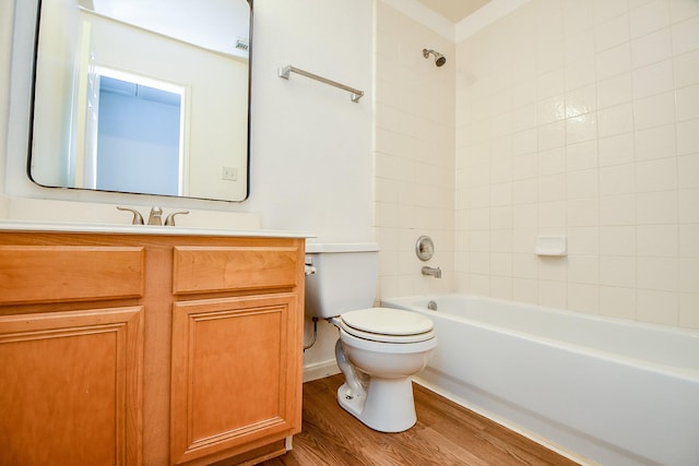 20019 Laramie River Trl, Katy, TX 77449 - full bathroom with toilet, wood finished floors, vanity, and washtub / shower combination