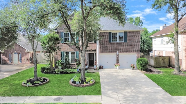 23227 Diamond Knoll Ct, Katy, TX 77494 - view of front of home with brick siding, a garage, driveway, and roof with shingles